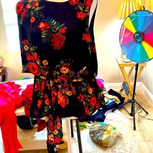 20” long (sleeve to bottom of shirt